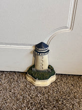 Load image into Gallery viewer, Lighthouse Cast Iron Doorstop
